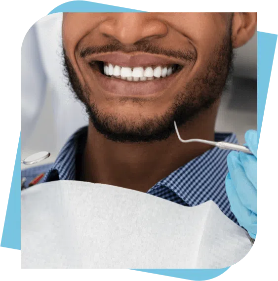 Man smiling before the dentist starts a procedure