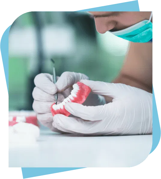 denturist fabricating a new set of dentures.