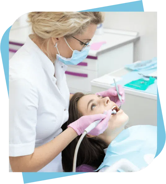 young woman getting a filling at the dentist