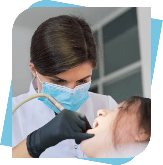 Dentist performing a procedure on a sedated patient