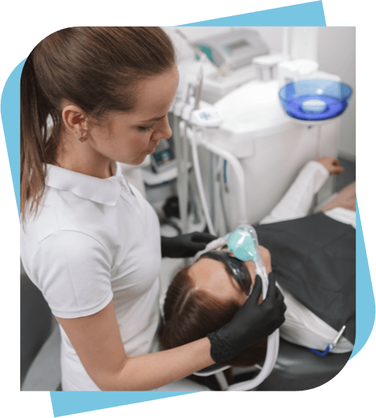 sedation dentist administering nitrous oxide before a procedure