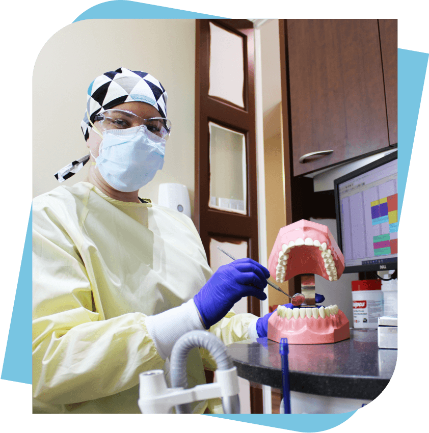 Dental Technician in a yellow medical gown and