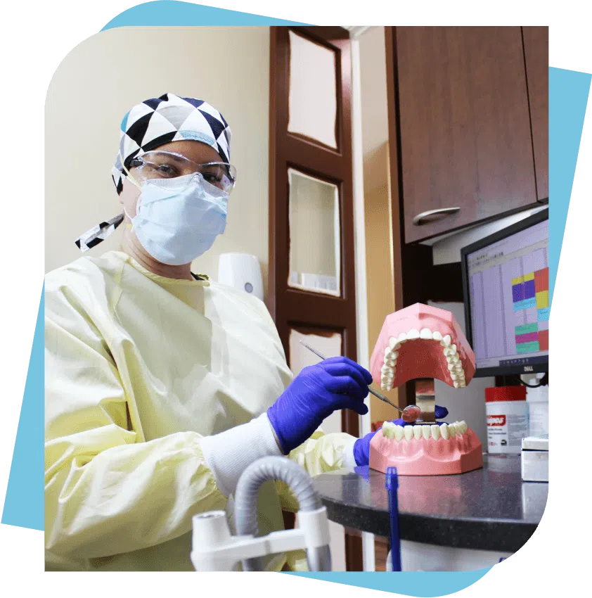 Dental Technician in a yellow medical gown and